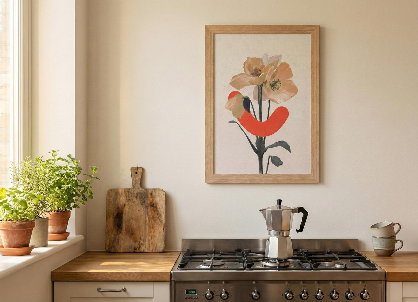 Kitchen with a gas stove, plants, and a floral painting on the wall.